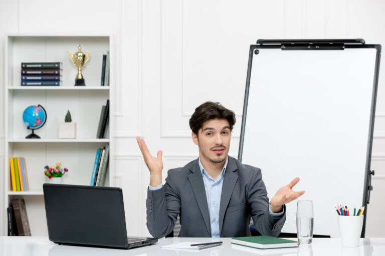 teacher-young-instructor-office-suit-class-with-laptop-whiteboard-waving-hands